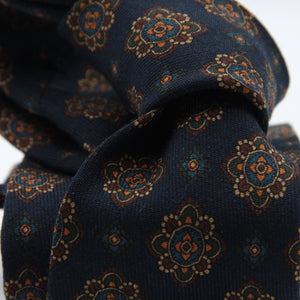 Cruciani &amp; Bella
Printed and Handmade in Italy
100% Wool
Unlined
Blue, Brown, Beige and Orange Motif Tie
8 cm x 150 cm
#9126