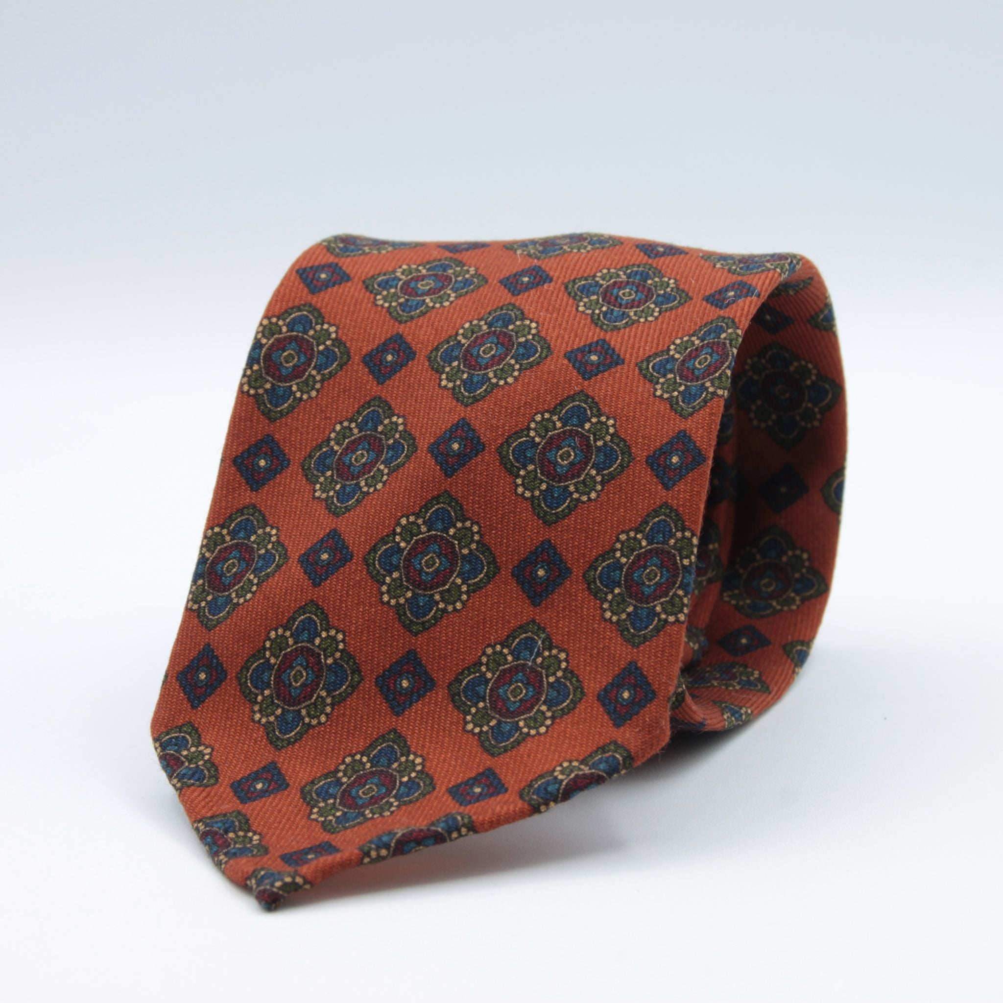 Cruciani &amp; Bella
Printed and Handmade in Italy
100% Wool
Unlined
Orange, Green, Blue and Red Motif Tie
8 cm x 150 cm
#9129