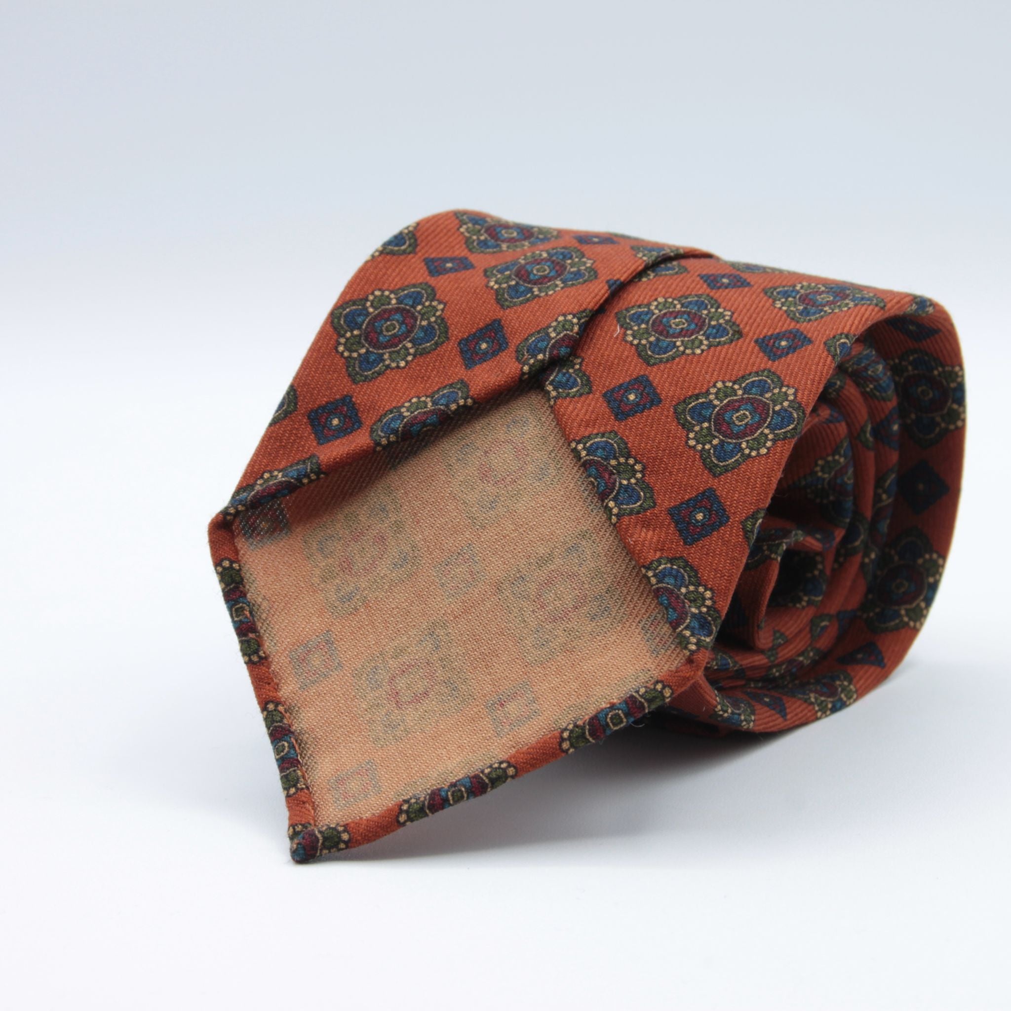 Cruciani &amp; Bella
Printed and Handmade in Italy
100% Wool
Unlined
Orange, Green, Blue and Red Motif Tie
8 cm x 150 cm
#9129