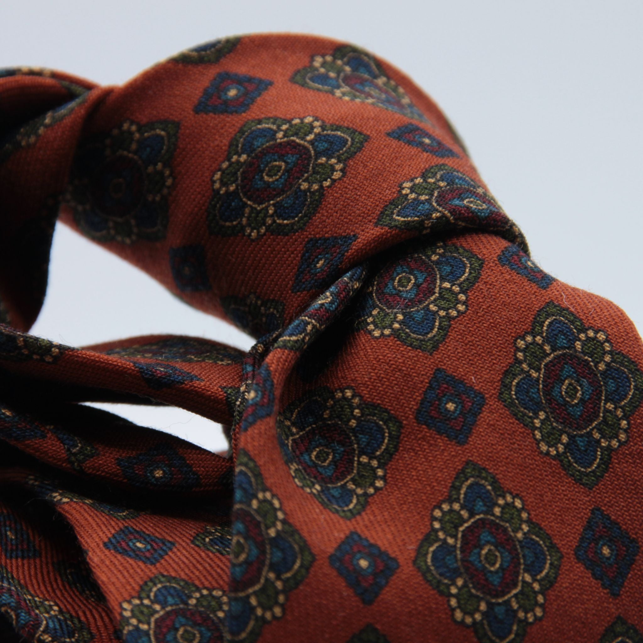 Cruciani &amp; Bella
Printed and Handmade in Italy
100% Wool
Unlined
Orange, Green, Blue and Red Motif Tie
8 cm x 150 cm
#9129