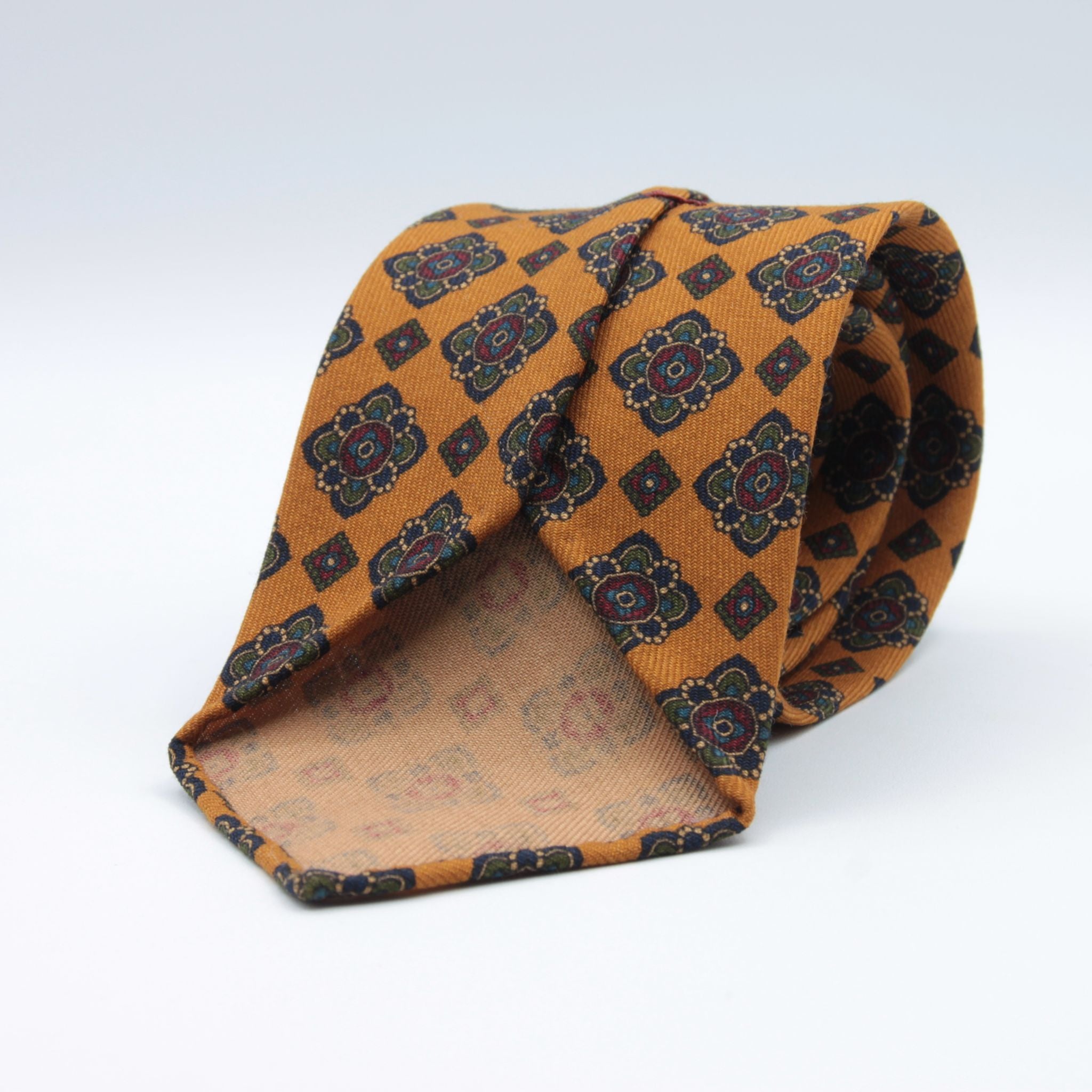 Cruciani &amp; Bella
Printed and Handmade in Italy
100% Wool
Unlined
Orange, Green, Blue and Red Motif Tie
8 cm x 150 cm
#9130