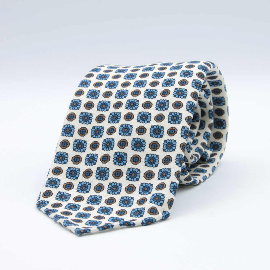 Cruciani &amp; Bella
Printed and Handmade in Italy
100% Wool
Unlined
White, Blue and Brown Motif Tie
8 cm x 150 cm
#9137