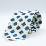 Cruciani &amp; Bella
Printed and Handmade in Italy
100% Wool
Unlined
White, Blue and Light Blue&nbsp; Motif Tie
8 cm x 150 cm
#9141