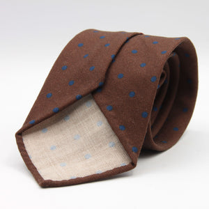 Cruciani &amp; Bella
Printed and Handmade in Italy
100% Wool
Unlined
Brown and Blue Dots Motif Tie
8 cm x 150 cm
#9174