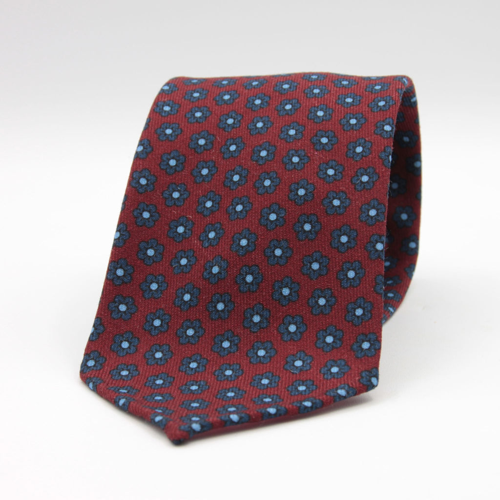 Cruciani &amp; Bella
Printed and Handmade in Italy
100% Wool
Unlined
Red, Blue and Light Blue Motif Tie
8 cm x 150 cm
#9181