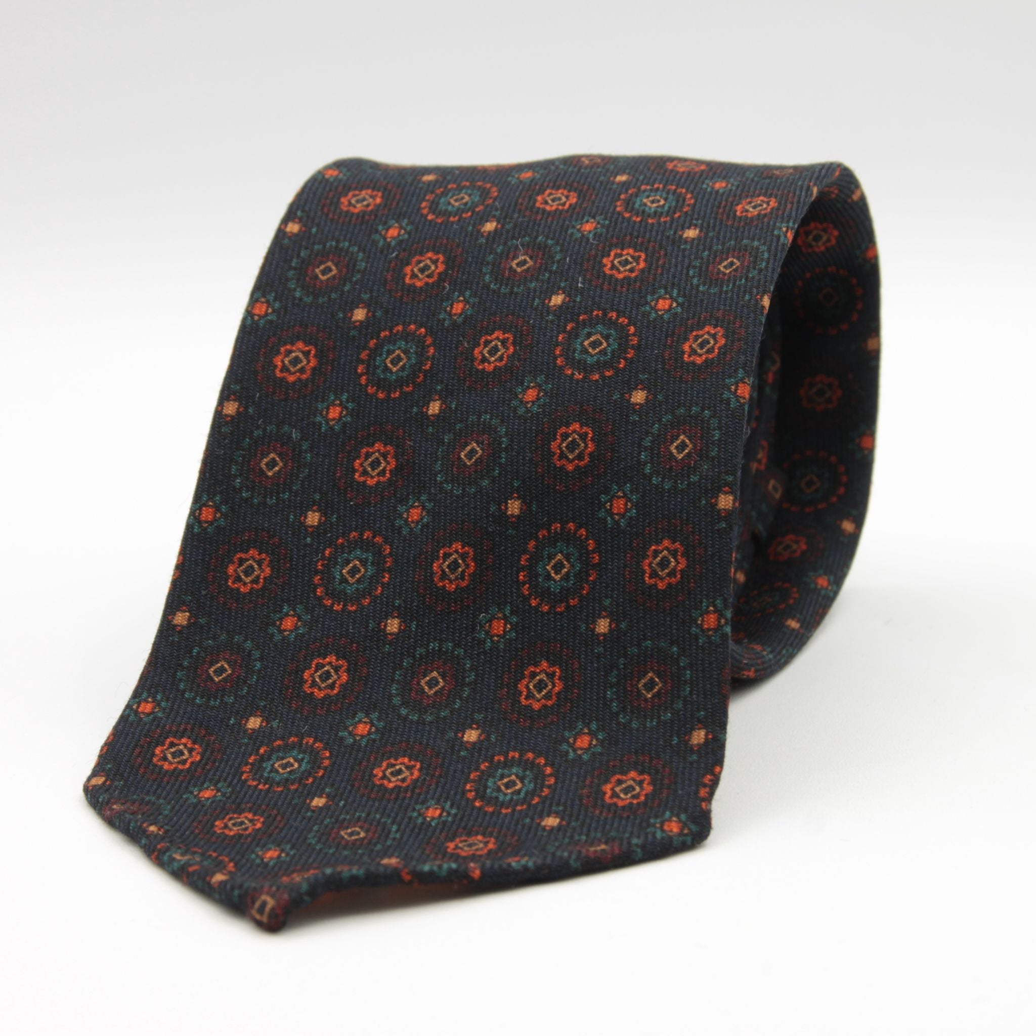 Cruciani &amp; Bella
Printed and Handmade in Italy
100% Wool
Unlined
Blue, Orange, Turquoise and Beige Motif Tie
8 cm x 150 cm
#9182