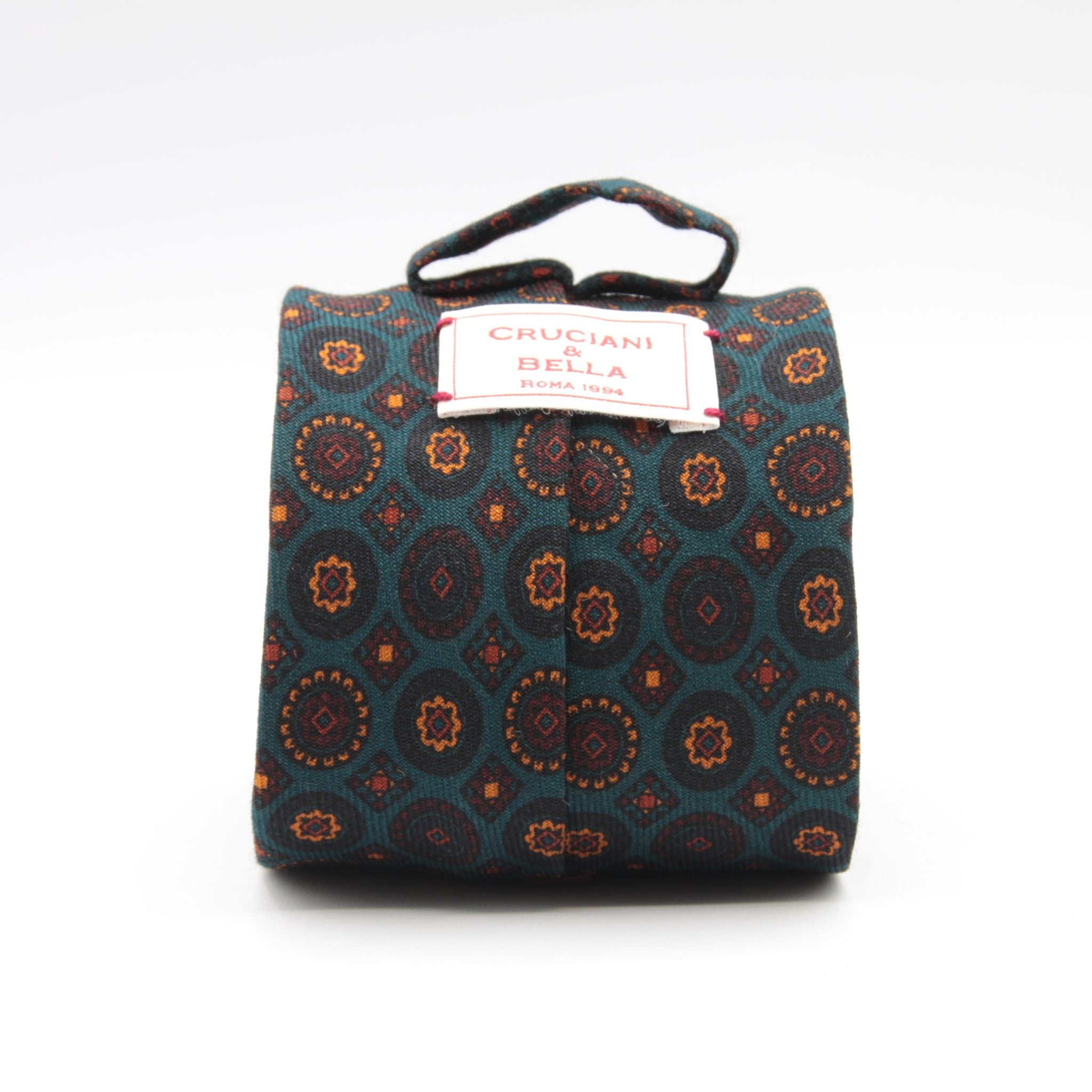 Cruciani &amp; Bella
Printed and Handmade in Italy
100% Wool
Unlined
Turquoise, Rust, Beige and Blue Motif Tie
8 cm x 150 cm
#9183