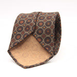 Cruciani &amp; Bella
Printed and Handmade in Italy
100% Wool
Unlined
Grey, Rust, Beige and Orange Motif Tie
8 cm x 150 cm
#9186