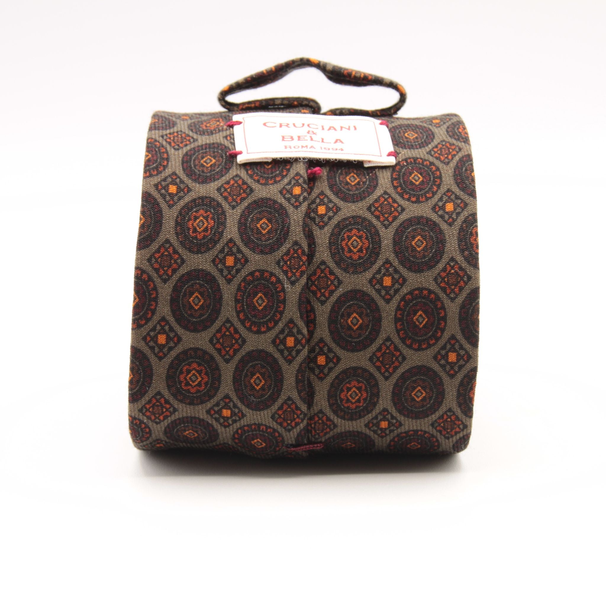 Cruciani &amp; Bella
Printed and Handmade in Italy
100% Wool
Unlined
Grey, Rust, Beige and Orange Motif Tie
8 cm x 150 cm
#9186