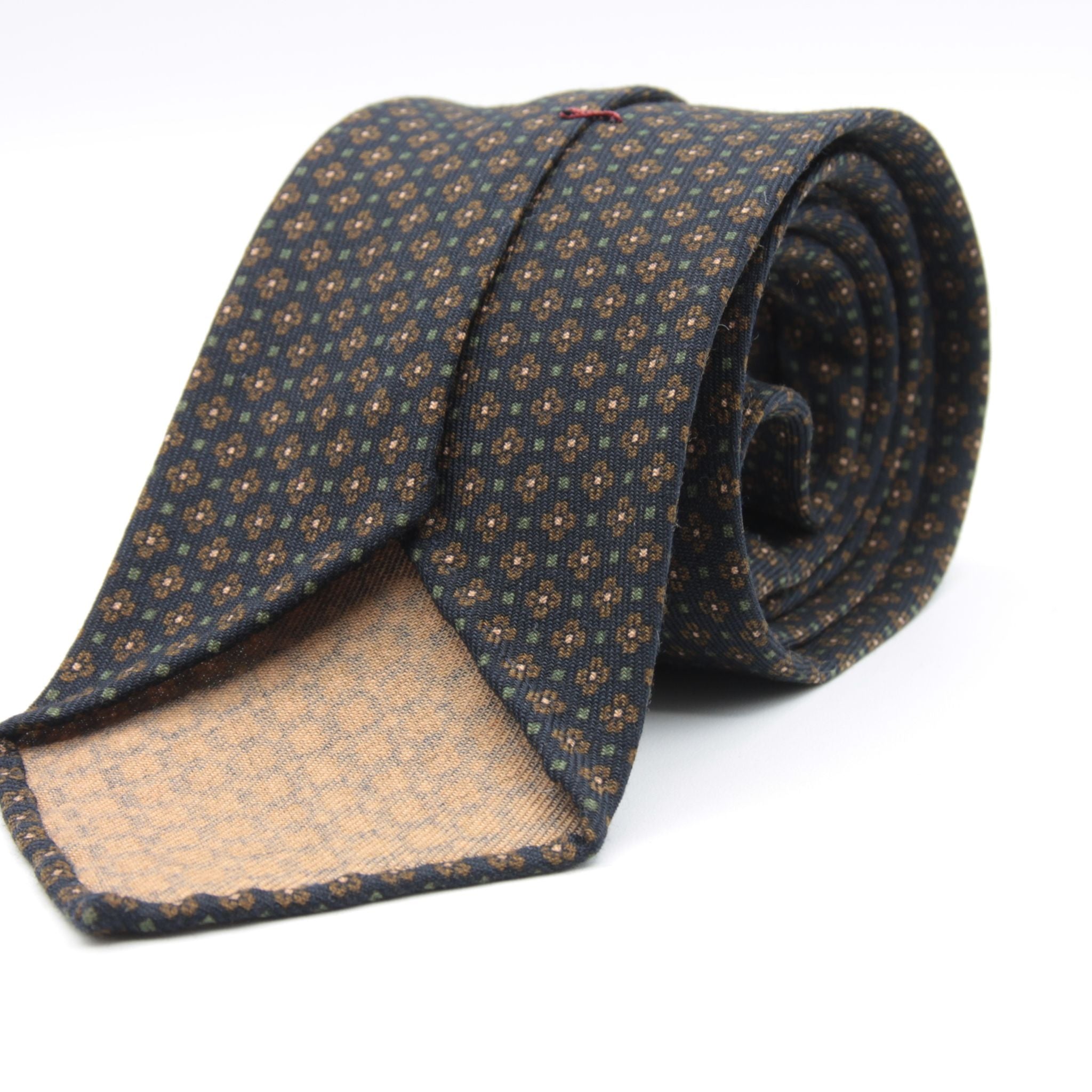 Cruciani &amp; Bella
Printed and Handmade in Italy
100% Wool
Unlined
Blue, Brown and Military Green Motif Tie
8 cm x 150 cm
#9192