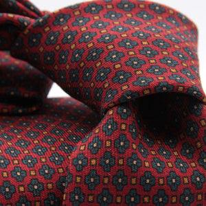 Cruciani &amp; Bella
Printed and Handmade in Italy
100% Wool
Unlined
Red Wine, Octanium and Orange Motif Tie
8 cm x 150 cm
#9195