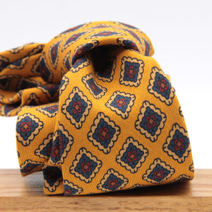 Cruciani &amp; Bella
Printed and Handmade in Italy
100% Wool
Unlined
Yellow, Blue and Red Motif Tie
8 cm x 150 cm
#9191