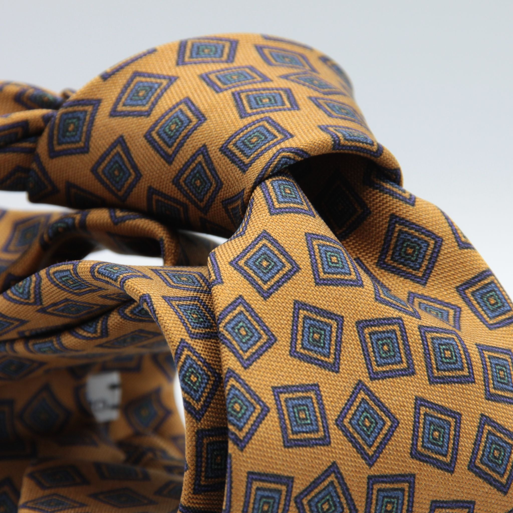 Cruciani &amp; Bella
100% Printed Hopsack Silk
Self Tipped
Handmade in England
Mustard, Violet, Blue and Green Tie
Cm 152 X 8
#9011