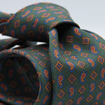 Cruciani &amp; Bella
100% Printed Hopsack Silk
Self Tipped
Handmade in England
Green, Blue, Orange and Red Tie
Cm 152 X 8
#9014