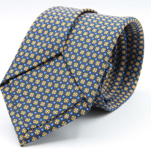 Holliday &amp; Brown for Cruciani &amp; Bella
100% printed Silk
Self Tipped
Navy blue, mustard, light blue and white motif Tie
Handmade in Italy
8 cm x 150 cm
#8963