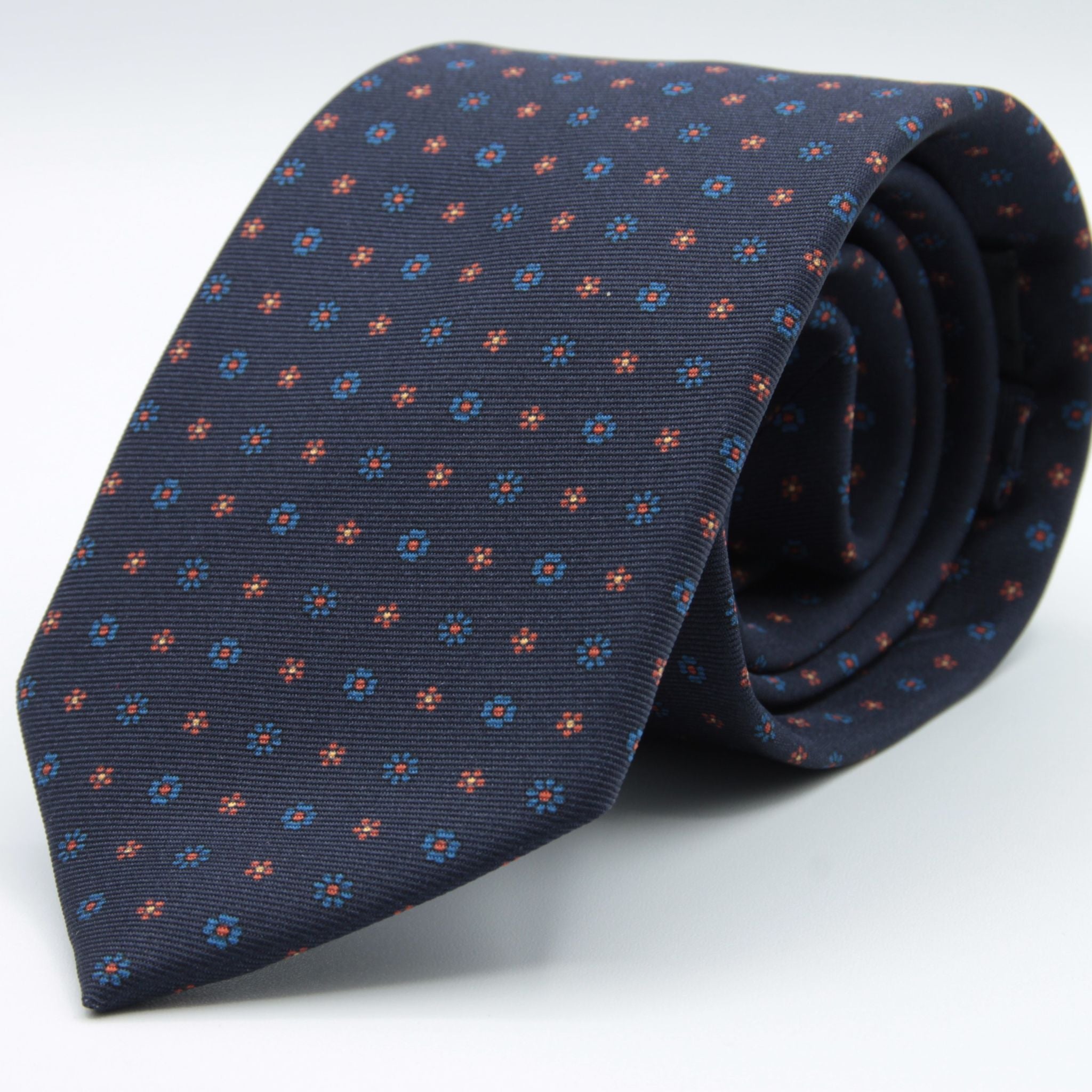 Holliday &amp; Brown for Cruciani &amp; Bella
100% printed Silk
Self Tipped
Navy Blue, Rust, Light Blue and Yellow motif Tie
Handmade in Italy
8 cm x 150 cm
#8941