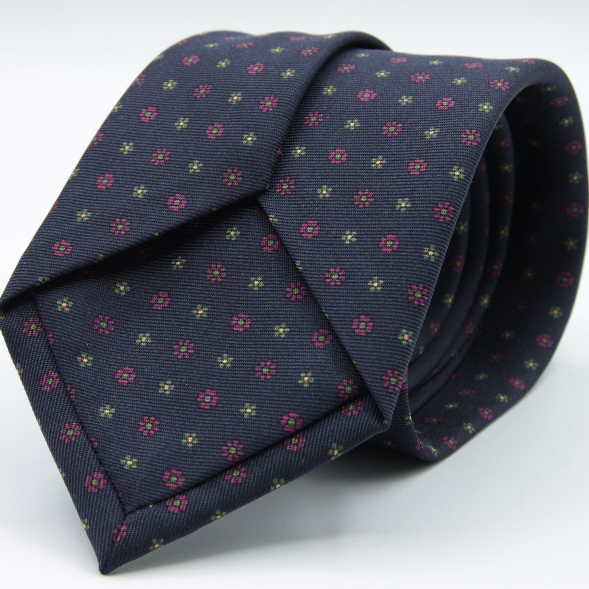 Holliday &amp; Brown for Cruciani &amp; Bella
100% printed Silk
Self Tipped
Navy Blue, Fucsia, Green and Yellow motif Tie
Handmade in Italy
8 cm x 150 cm
#8943