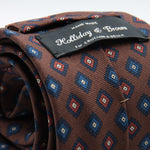 Holliday &amp; Brown for Cruciani &amp; Bella
100% printed Madder Silk
Self Tipped
Brown, Navy Blue and Rust medallions motif Tie
Handmade in Italy
8 cm x 150 cm
#8957