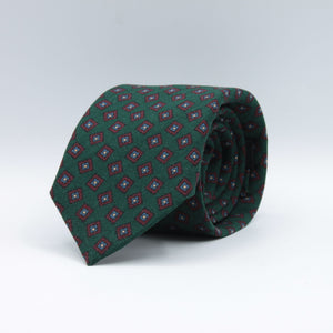 Holliday &amp; Brown for Cruciani &amp; Bella
100% Printed Wool
Self-Tipped

Forrest Green, Light Blue and Red Wine Color motif tie
Handmade in Italy

8 cm x 150 cm
#8985