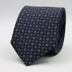 Holliday &amp; Brown for Cruciani &amp; Bella
100% Printed Silk
Self Tipped
Dark Blue, Light Blue, Grey and Fuchsia motif Tie
Handmade in Italy
8 cm x 150 cm
#9360