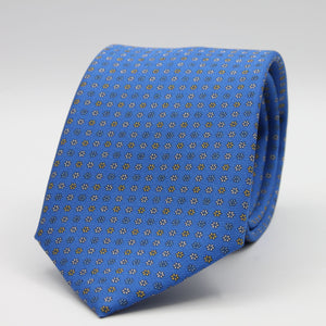 Holliday &amp; Brown for Cruciani &amp; Bella
100% Printed Silk
Self Tipped
Light Blue, Yellow and White motif Tie
Handmade in Italy
8 cm x 150 cm
#9366