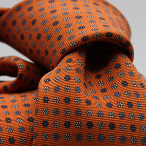 Holliday &amp; Brown for Cruciani &amp; Bella
100% Printed Silk
Self Tipped
Light Orange, Navy Blue, Light Blue and White motif Tie
Handmade in Italy
8 cm x 150 cm
#9354