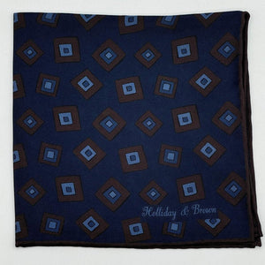 Holliday &amp; Brown
Hand-rolled&nbsp;&nbsp;
Holliday &amp; Brown for Cruciani &amp; Bella
100% Silk
Navy Blue, Brown and Light Blue
Double Faces
Motif&nbsp; Pocket Square
Handmade in Italy

32 cm X 32 cm