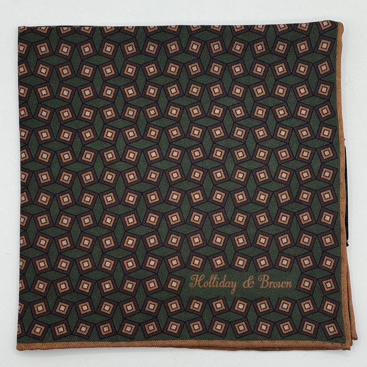 Holliday &amp; Brown
Hand-rolled&nbsp;&nbsp;
Holliday &amp; Brown for Cruciani &amp; Bella
100% Silk
Green, Brown&nbsp; and Light Brown
Double Faces
Dots Motif&nbsp; Pocket Square
Handmade in Italy

32 cm X 32 cm