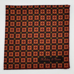 Holliday &amp; Brown for Cruciani &amp; Bella
Hand-rolled&nbsp;&nbsp;

100% Silk
Black, Brown, Red Wine and Gold
Double Faces
Motif&nbsp; Pocket Square
Handmade in Italy

32 cm X 32 cm