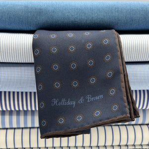 Holliday &amp; Brown for Cruciani &amp; Bella
Hand-rolled&nbsp;&nbsp;

100% Silk
Dark Blue, Brown and Light Blue
Double Faces
Motif&nbsp; Pocket Square
Handmade in Italy

32 cm X 32 cm