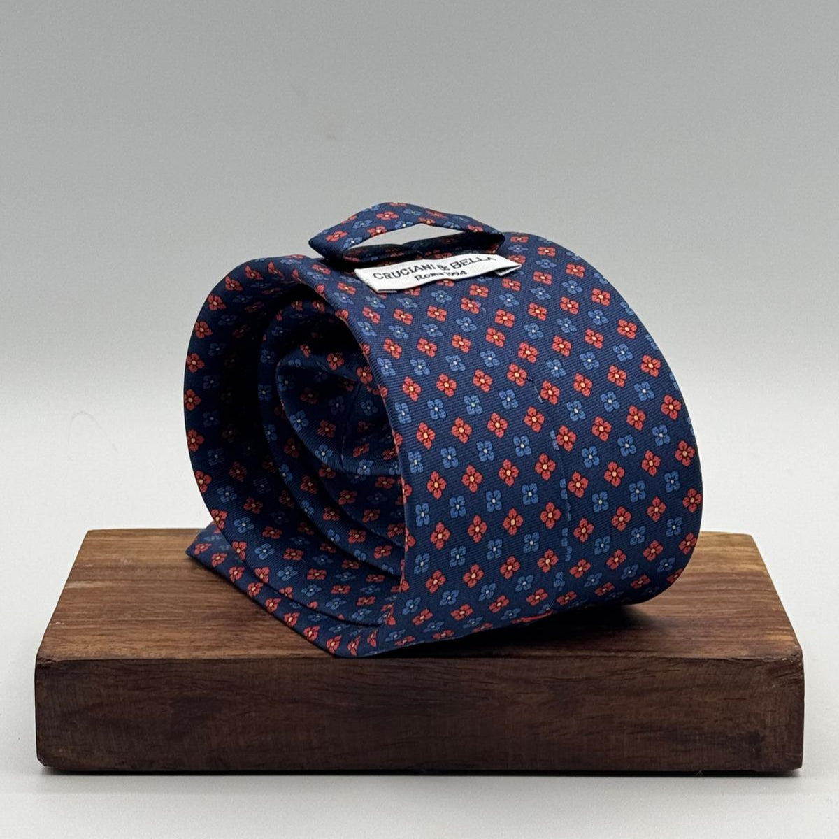 Cruciani &amp; Bella
100% Printed Silk&nbsp;
Tipped
Blue, Red, Light Blue and Yellow Motif Tie
Handmade in Italy
8,5 cm x 148 cm
New Old Stock