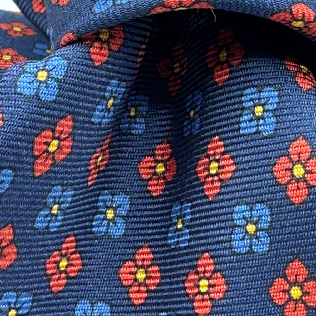 Cruciani &amp; Bella
100% Printed Silk&nbsp;
Tipped
Blue, Red, Light Blue and Yellow Motif Tie
Handmade in Italy
8,5 cm x 148 cm
New Old Stock