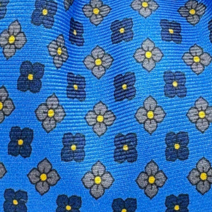Cruciani &amp; Bella
100% Printed Silk&nbsp;
Tipped
Light Blue, Blue, Light Brown White Yellow Motif Tie
Handmade in Italy
8,5 cm x 148 cm
New Old Stock