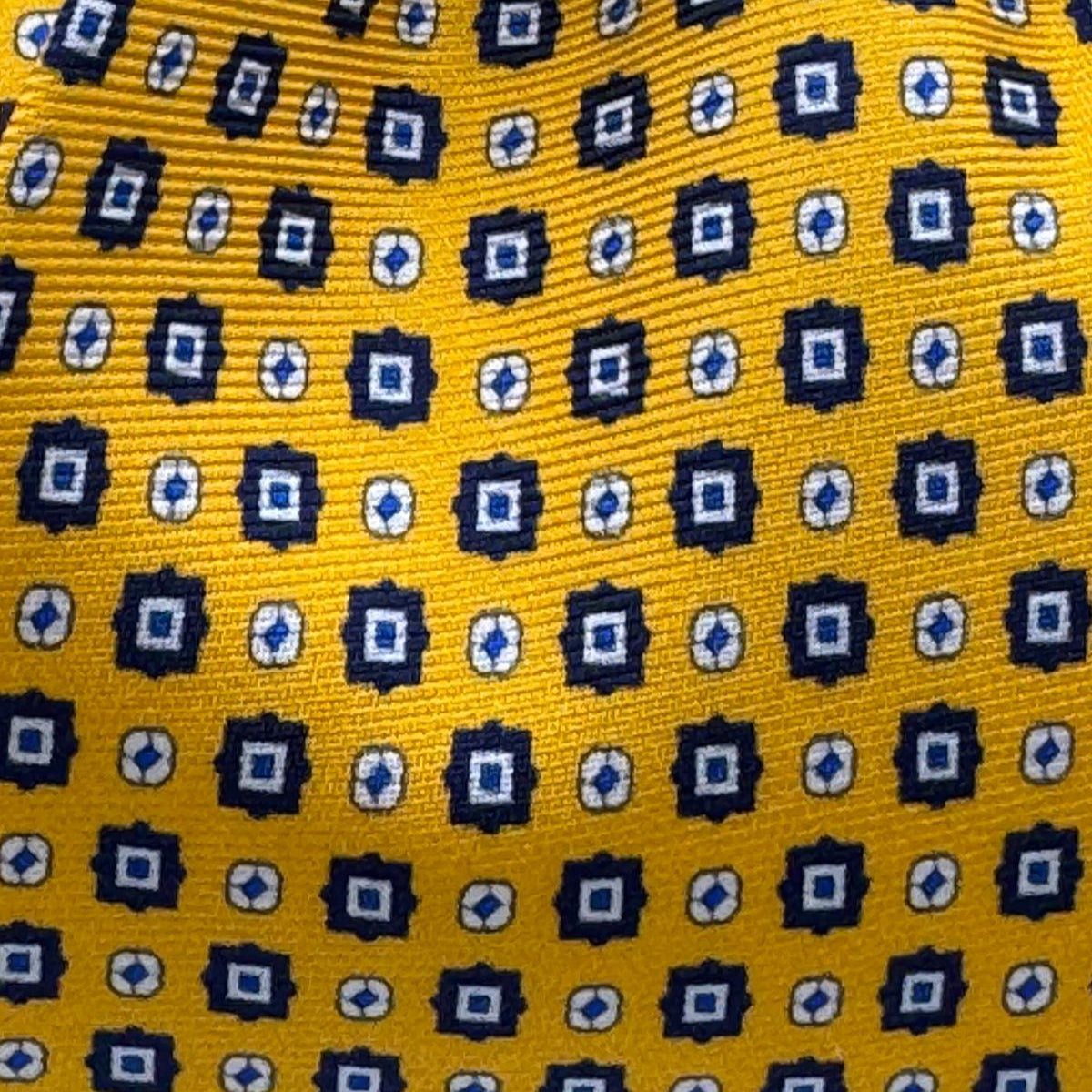 Cruciani &amp; Bella
100% Printed Silk&nbsp;
Tipped
Yellow, Light Blue and White Motif Tie
Handmade in Italy
8,5 cm x 148 cm
New Old Stock