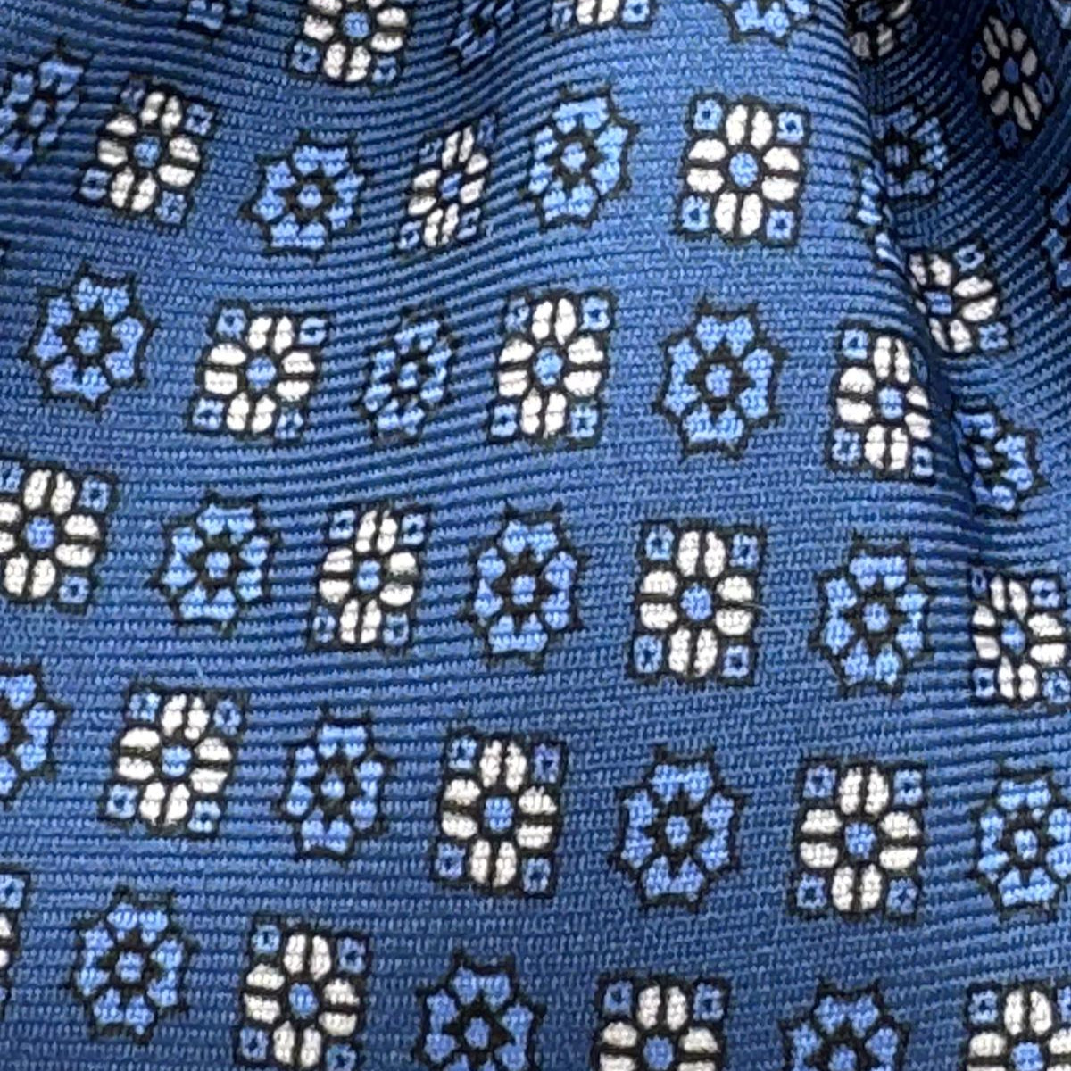 Cruciani &amp; Bella
100% Printed Silk&nbsp;
Tipped
Baby Blue, Light Blue and White Motif Tie
Handmade in Italy
8,5 cm x 148 cm
New Old Stock
