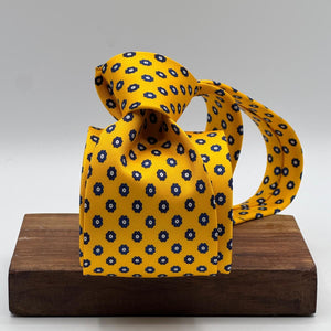 Cruciani &amp; Bella
100% Printed Silk&nbsp;
Tipped
Yellow, Blue and Grey White Motif Tie
Handmade in Italy
8,5 cm x 148 cm
New Old Stock