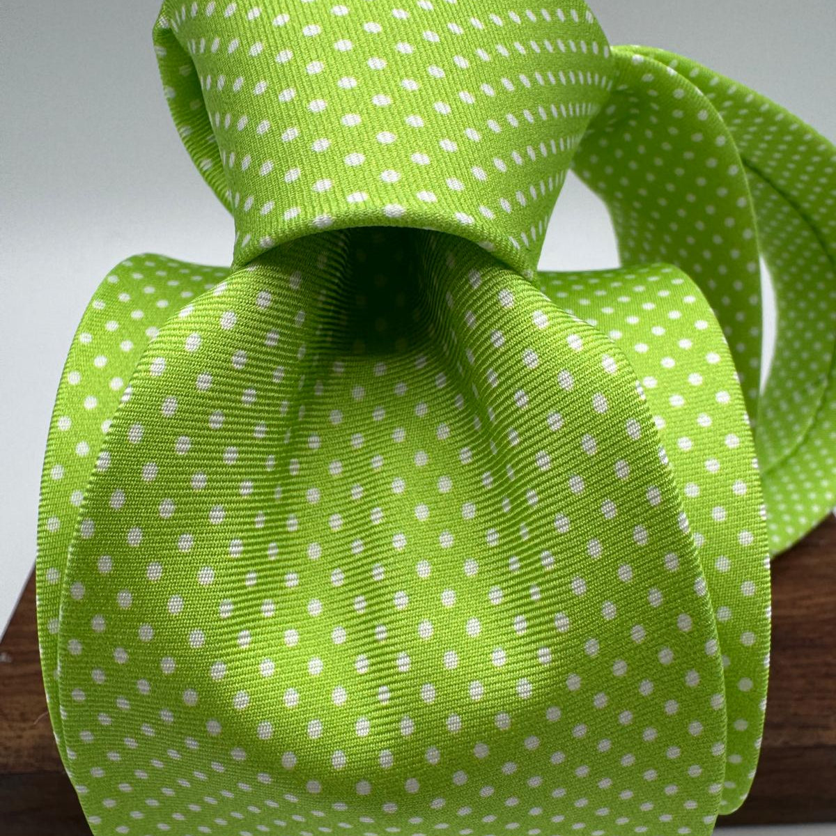 Cruciani &amp; Bella
100% Printed Silk&nbsp;
Tipped
Light Green and White Polka Dots Motif Tie
Handmade in Italy
8,5 cm x 148 cm
New Old Stock