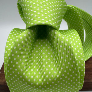 Cruciani &amp; Bella
100% Printed Silk&nbsp;
Tipped
Light Green and White Polka Dots Motif Tie
Handmade in Italy
8,5 cm x 148 cm
New Old Stock