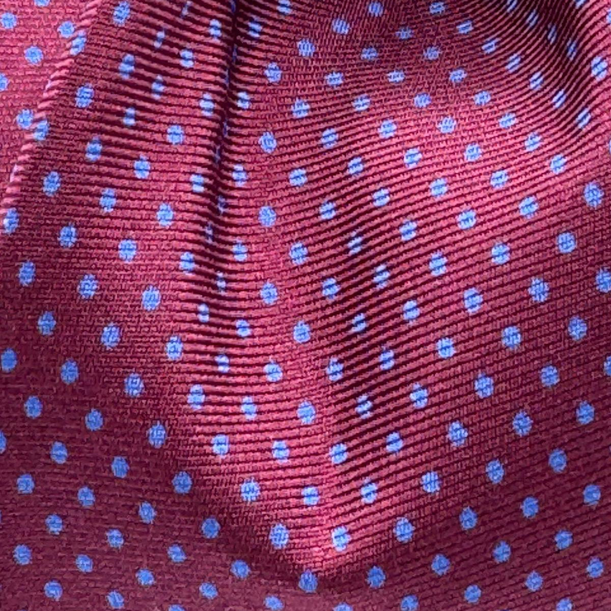 Cruciani &amp; Bella
100% Printed Silk&nbsp;
Tipped
Red Wine and Light Blue Polka Dots Motif Tie
Handmade in Italy
8,5 cm x 148 cm
New Old Stock
