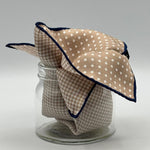 Holliday &amp; Brown
Blue Hand-rolled&nbsp;&nbsp;
Holliday &amp; Brown for Cruciani &amp; Bella
100% Silk
Sand and White
Double Faces
Dots and Pied de Poule Motif&nbsp; Pocket Square
Handmade in Italy

32 cm X 32 cm