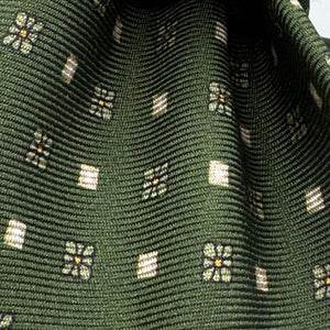 Cruciani &amp; Bella
100% Printed Silk&nbsp;
Tipped
Green, Light Blue and Yellow Motif Tie
Handmade in Italy
8,5 cm x 148 cm
New Old Stock