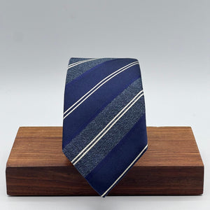 Cruciani &amp; Bella
100% Silk&nbsp;
Woven Jaquard
Tipped Tie
Blue, Light Blue and White Stripes
Handmade in Italy
7 cm x 148 cm
New Old Stock