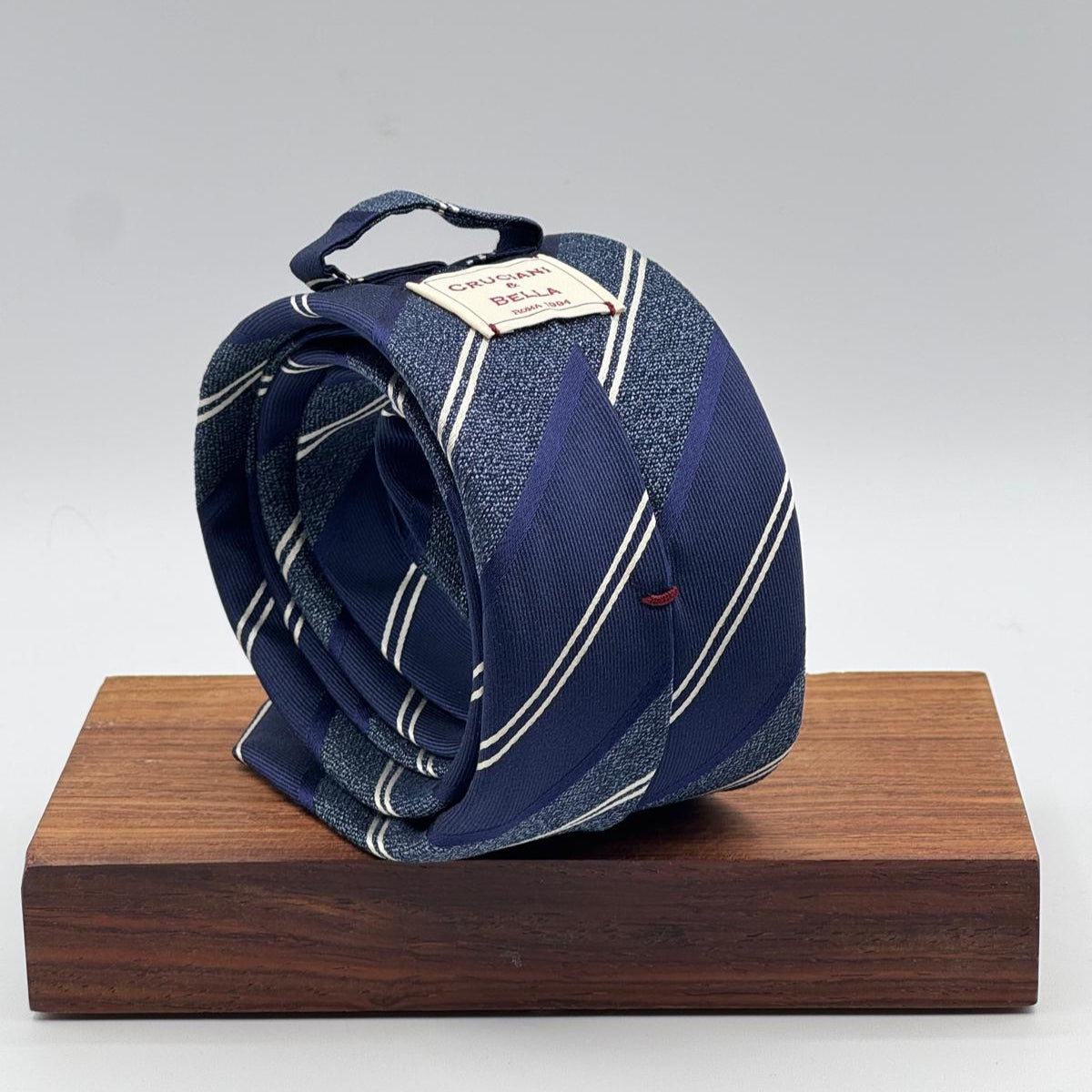 Cruciani &amp; Bella
100% Silk&nbsp;
Woven Jaquard
Tipped Tie
Blue, Light Blue and White Stripes
Handmade in Italy
7 cm x 148 cm
New Old Stock