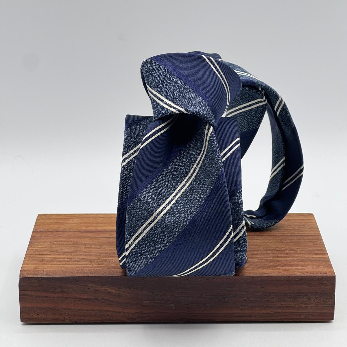 Cruciani &amp; Bella
100% Silk&nbsp;
Woven Jaquard
Tipped Tie
Blue, Light Blue and White Stripes
Handmade in Italy
 cm 7x 148 cm
New Old Stock