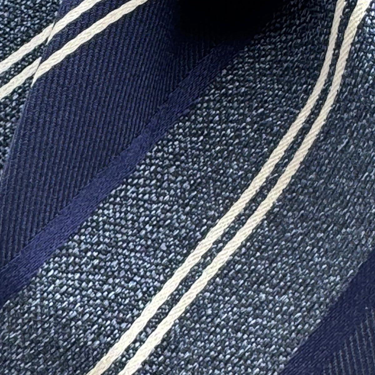 Cruciani &amp; Bella
100% Silk&nbsp;
Woven Jaquard
Tipped Tie
Blue, Light Blue and White Stripes
Handmade in Italy
7 cm x 148 cm
New Old Stock