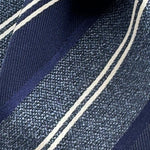 Cruciani &amp; Bella
100% Silk&nbsp;
Woven Jaquard
Tipped Tie
Blue, Light Blue and White Stripes
Handmade in Italy
7 cm x 148 cm
New Old Stock