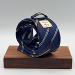 Cruciani &amp; Bella
100% Silk&nbsp;
Woven Jaquard
Tipped Tie
Blue, Brown and White Stripes
Handmade in Italy
7 cm x 148 cm
New Old Stock