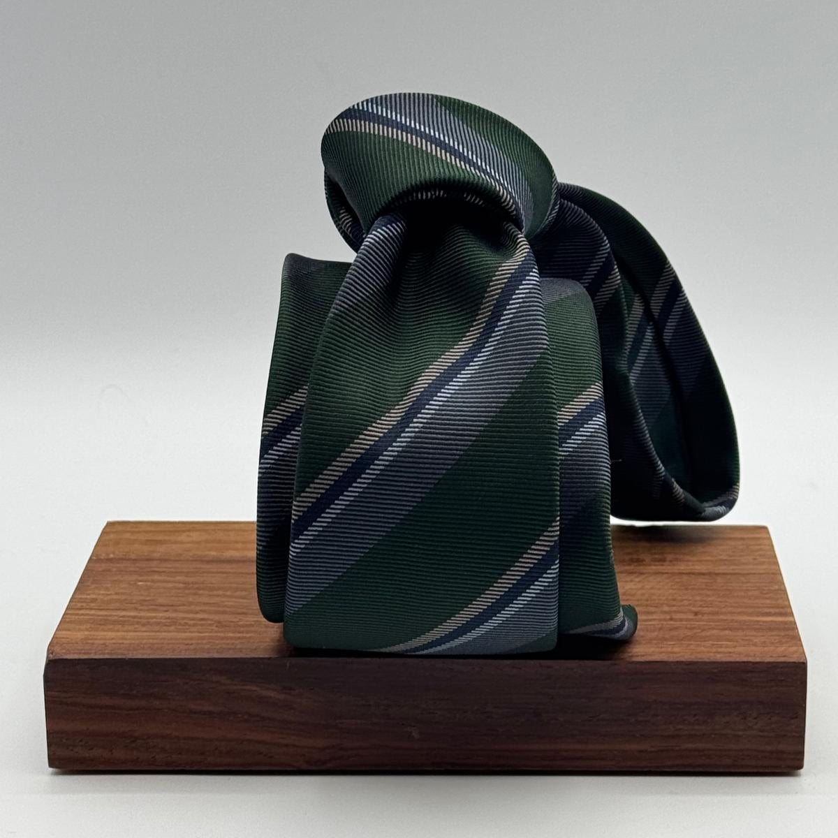 Cruciani &amp; Bella
100% Woven Silk&nbsp;

Self Tipped&nbsp;
Green, Grey and Light Blue stripes

Handmade in Italy
8 cm x 148 cm
New Old Stock