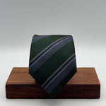 Cruciani &amp; Bella
100% Woven Silk&nbsp;

Self Tipped&nbsp;
Green, Grey and Light Blue stripes

Handmade in Italy
8 cm x 148 cm
New Old Stock
