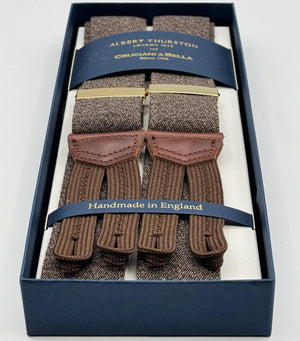Albert Thurston for Cruciani &amp; Bella
Made in England
Adjustable Sizing
35 mm elastic Brown Plain Melange Braces
Braid ends
Y-Shaped
Gold Fittings
Size Multifit Adjustable&nbsp;Length:&nbsp;115cm (= 45 inch) Maximum